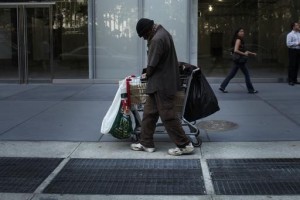 homeless man crossing street